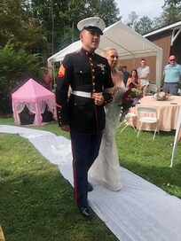 Brides Marine son walking her down the aisle