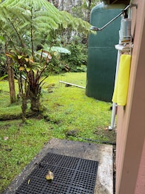 Outdoor shower handy for rinsing off from black sand beaches.