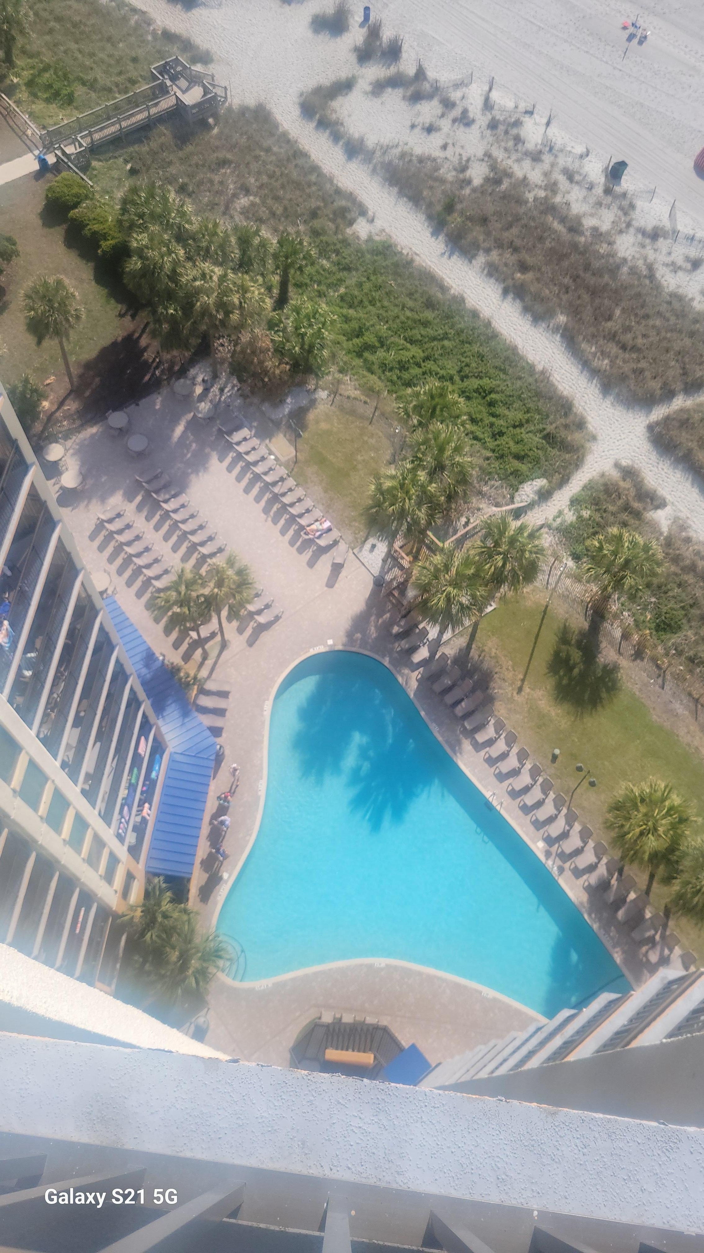 View from balcony to outdoor pool 