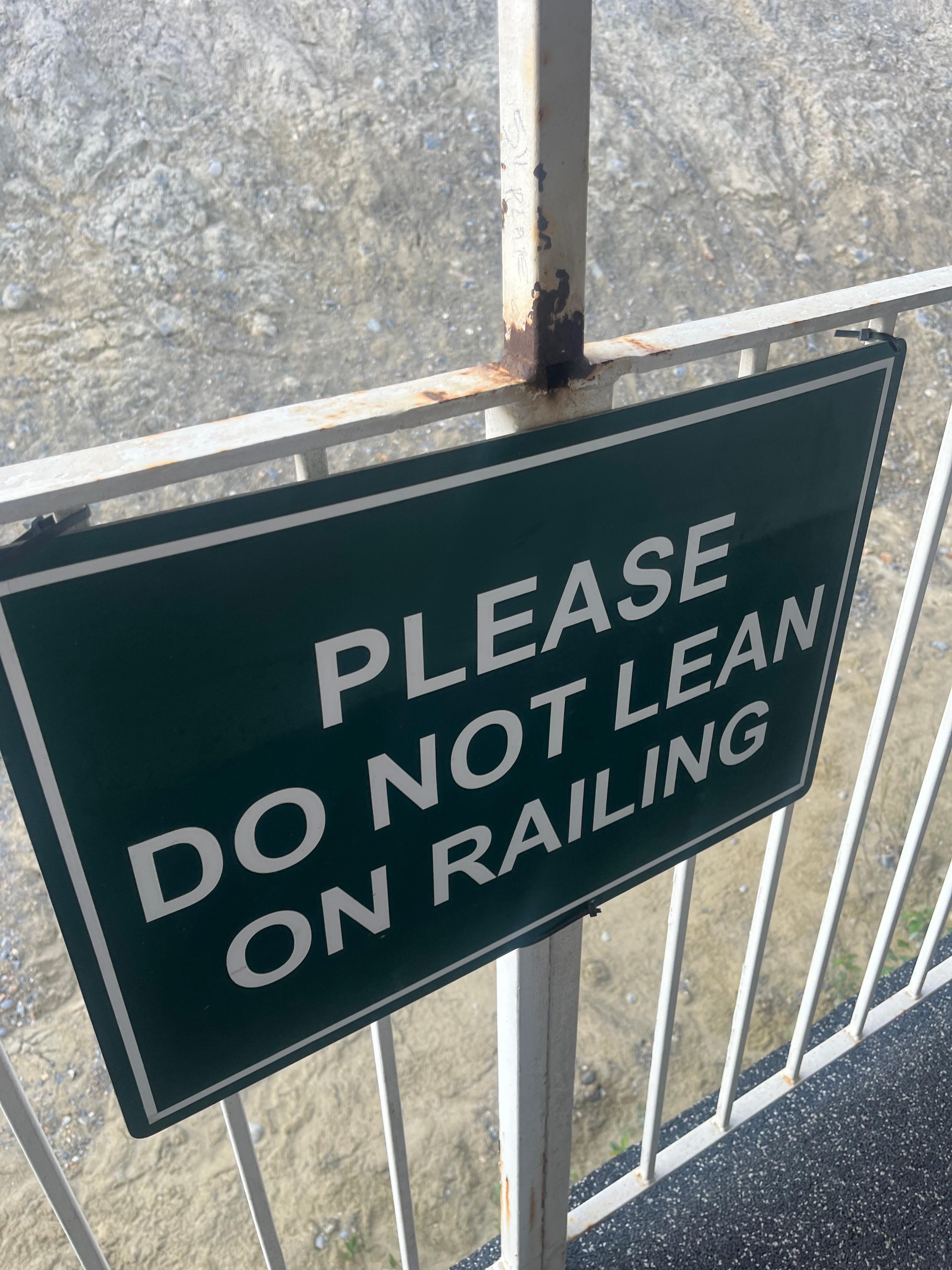 The railing outside the door.