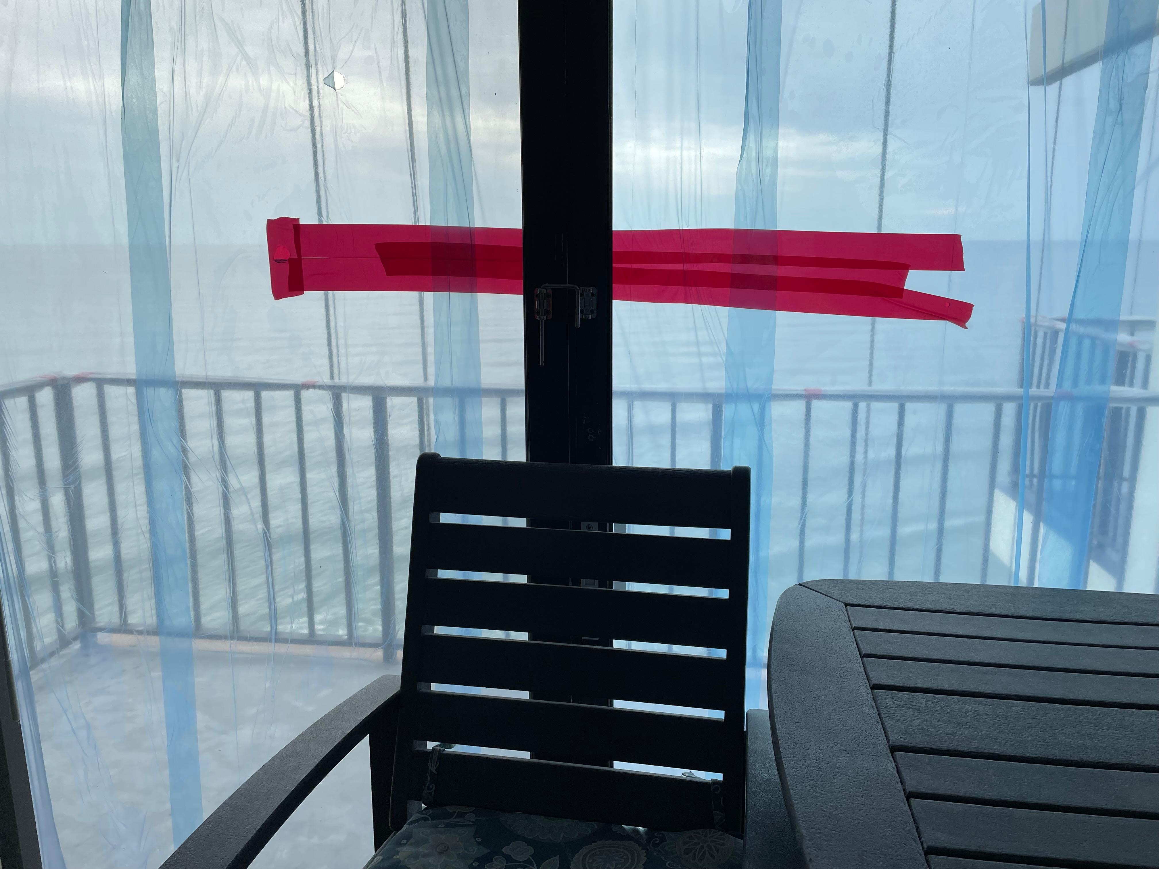 Balcony furniture piled up in living room 