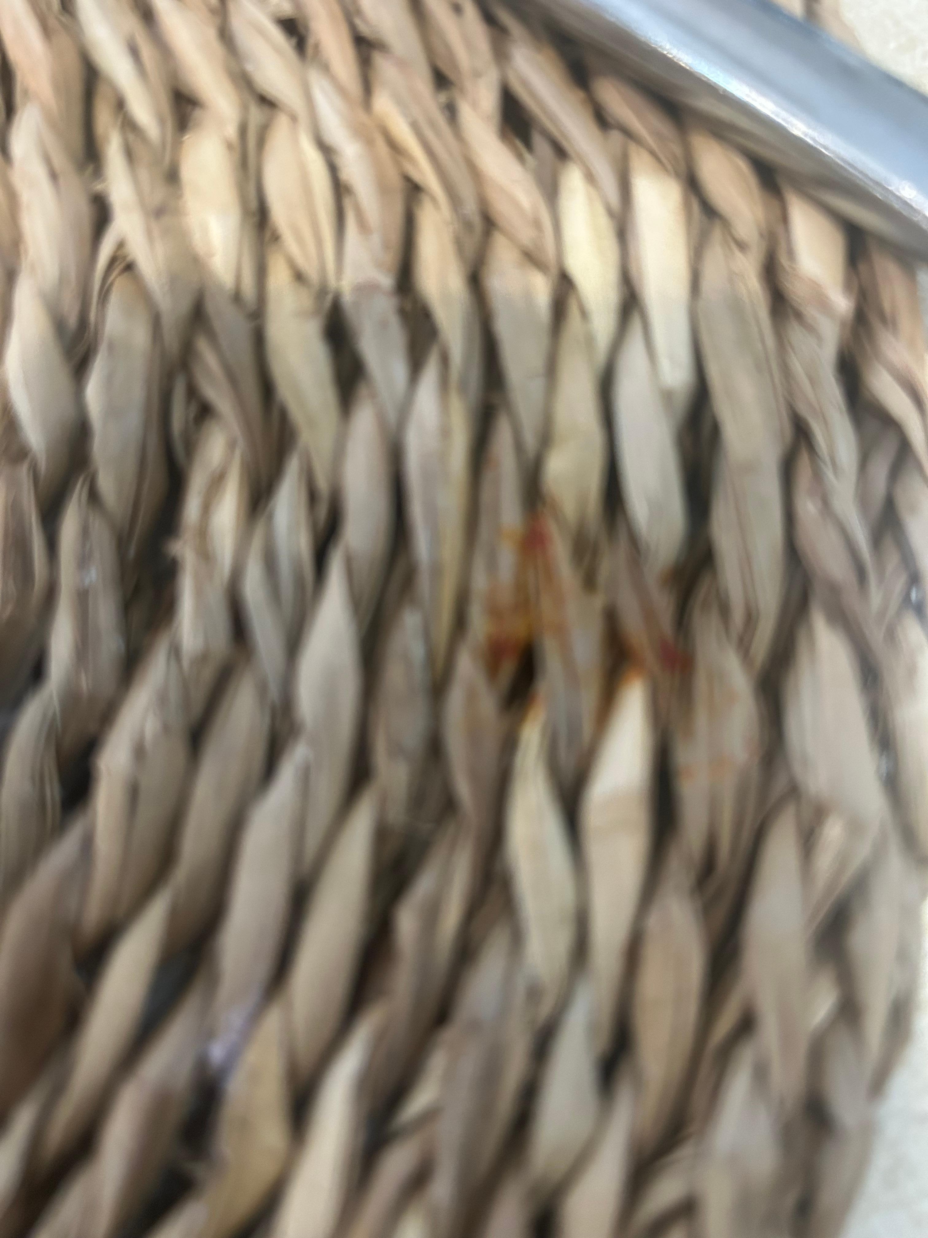 The dirty red old sauce on the food table mat.