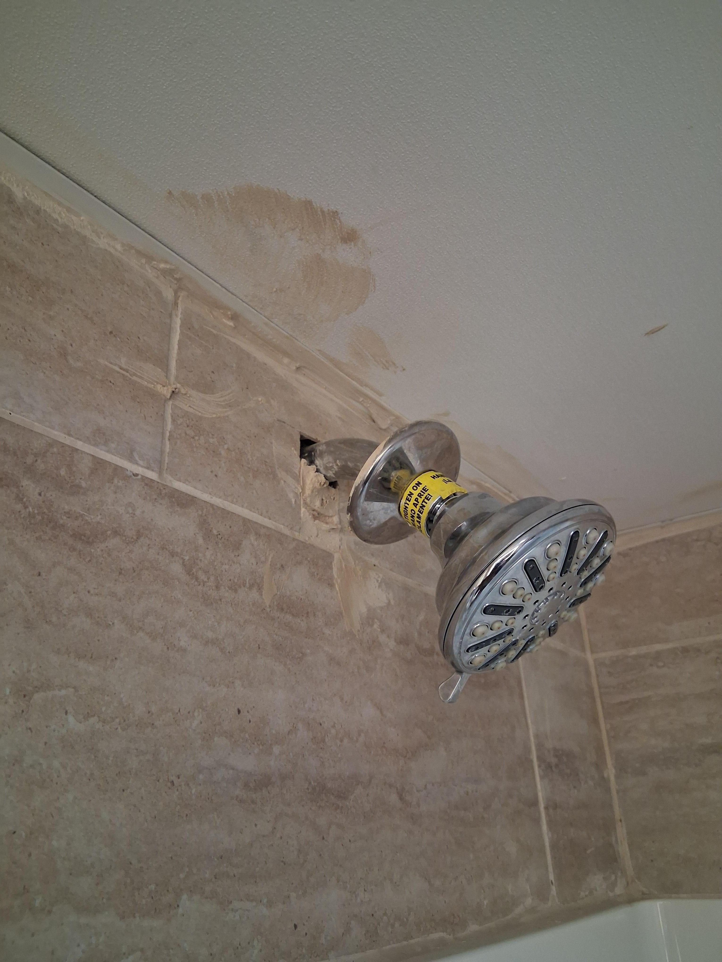 The repair and reinstallation work on the shower was poorly done.