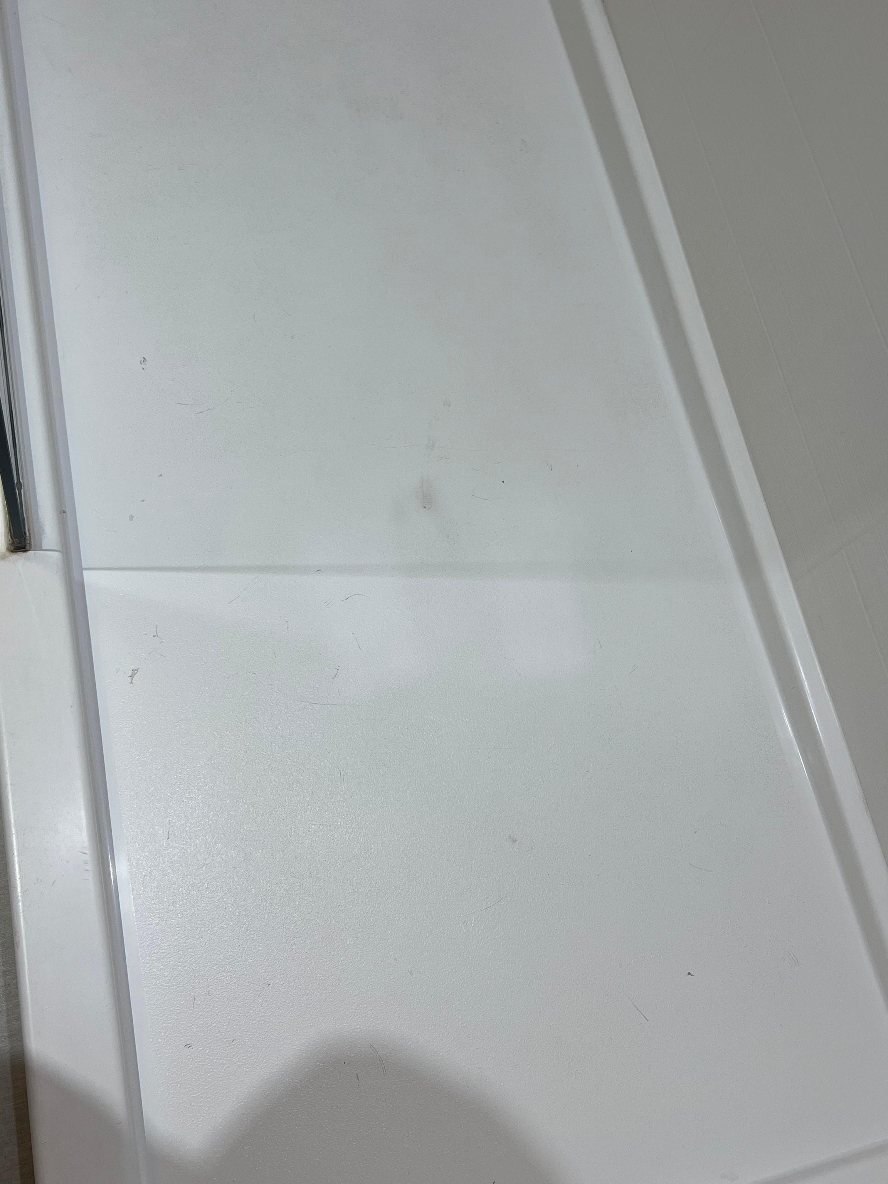 Stains and dirt on shower floor 