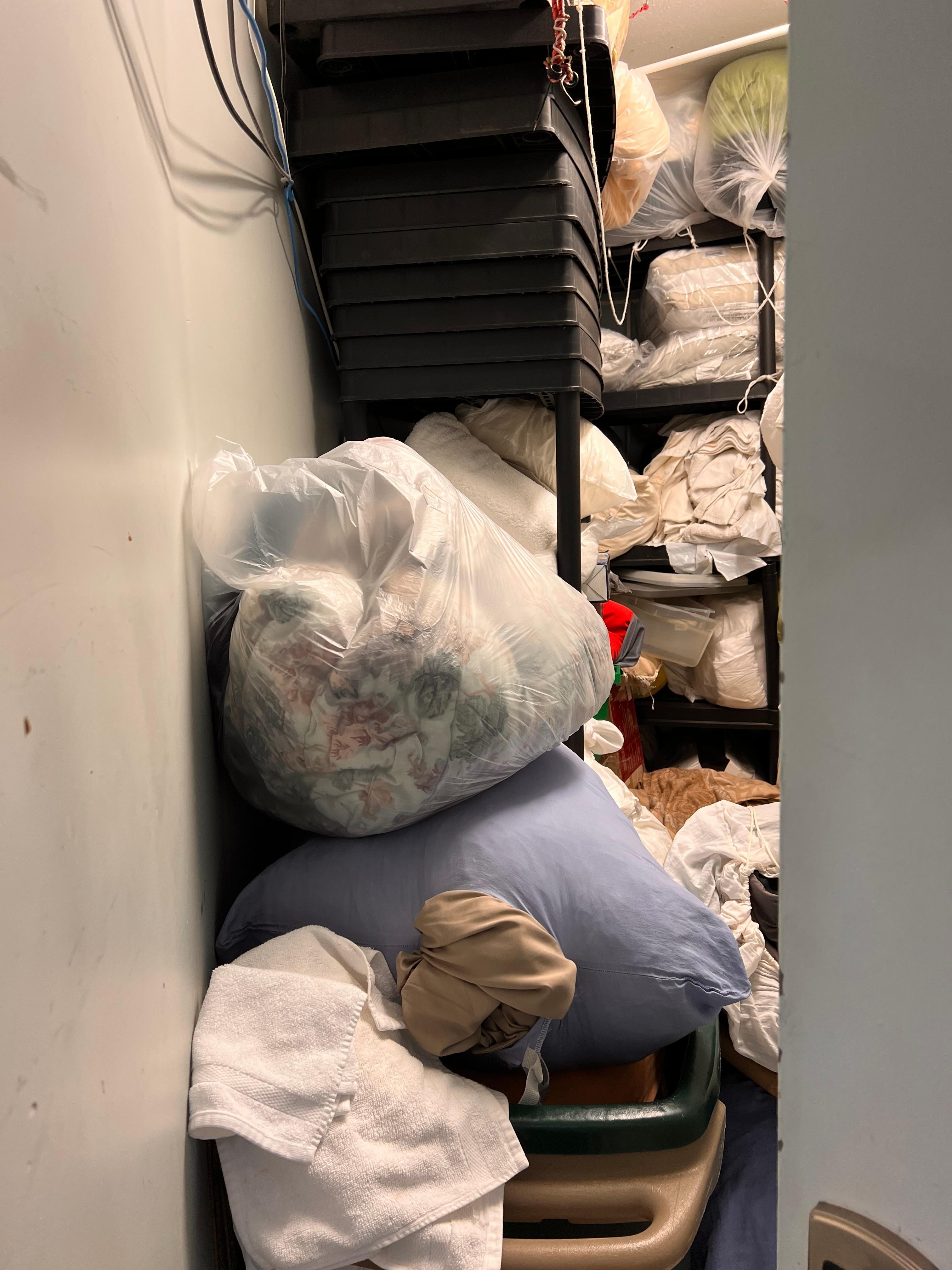 This is a linen closet with wires hanging down in it. Definite fire hazard. Rodent infestation was definitely present. Gross.