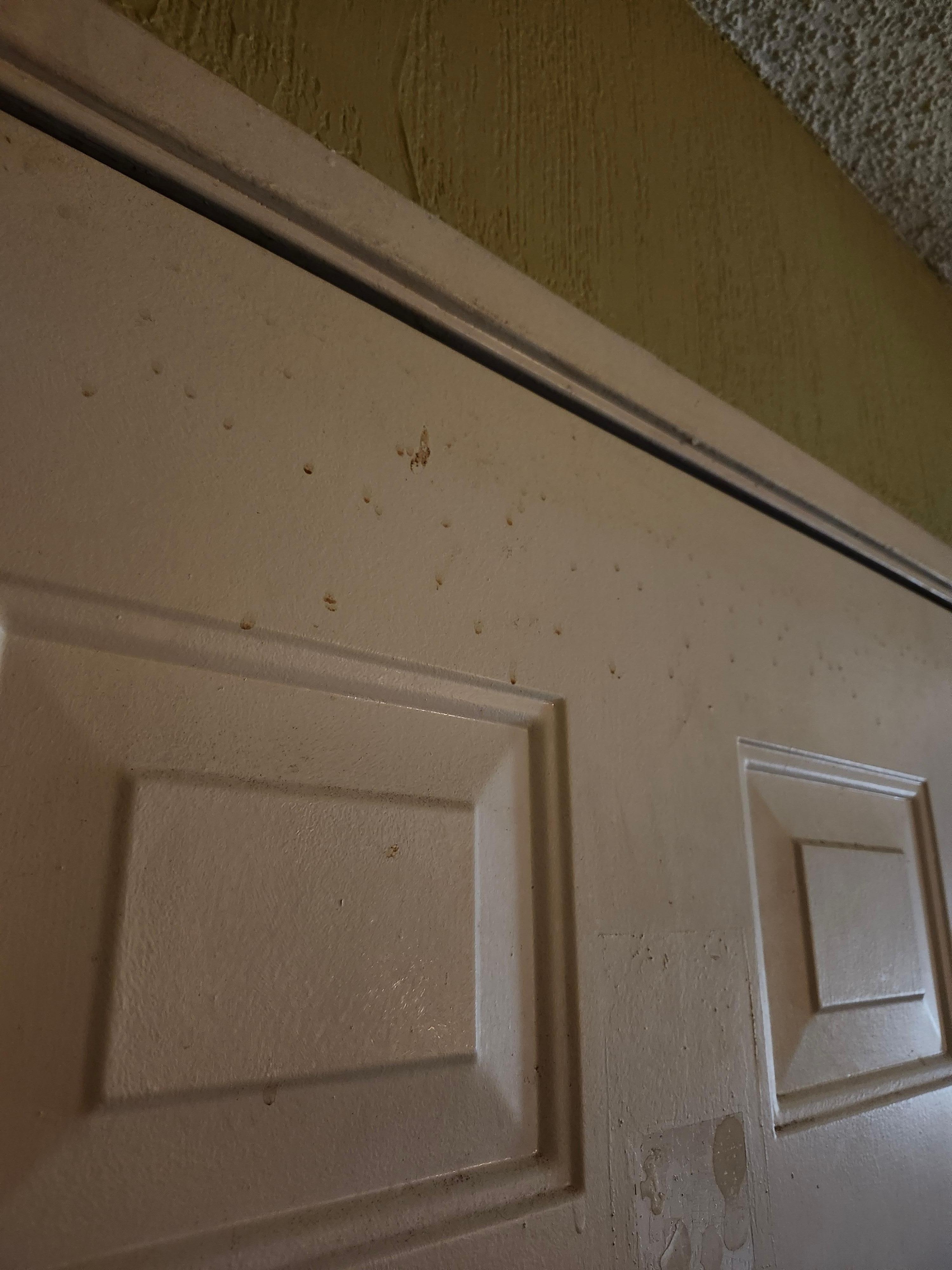 The front door covered in smoke 