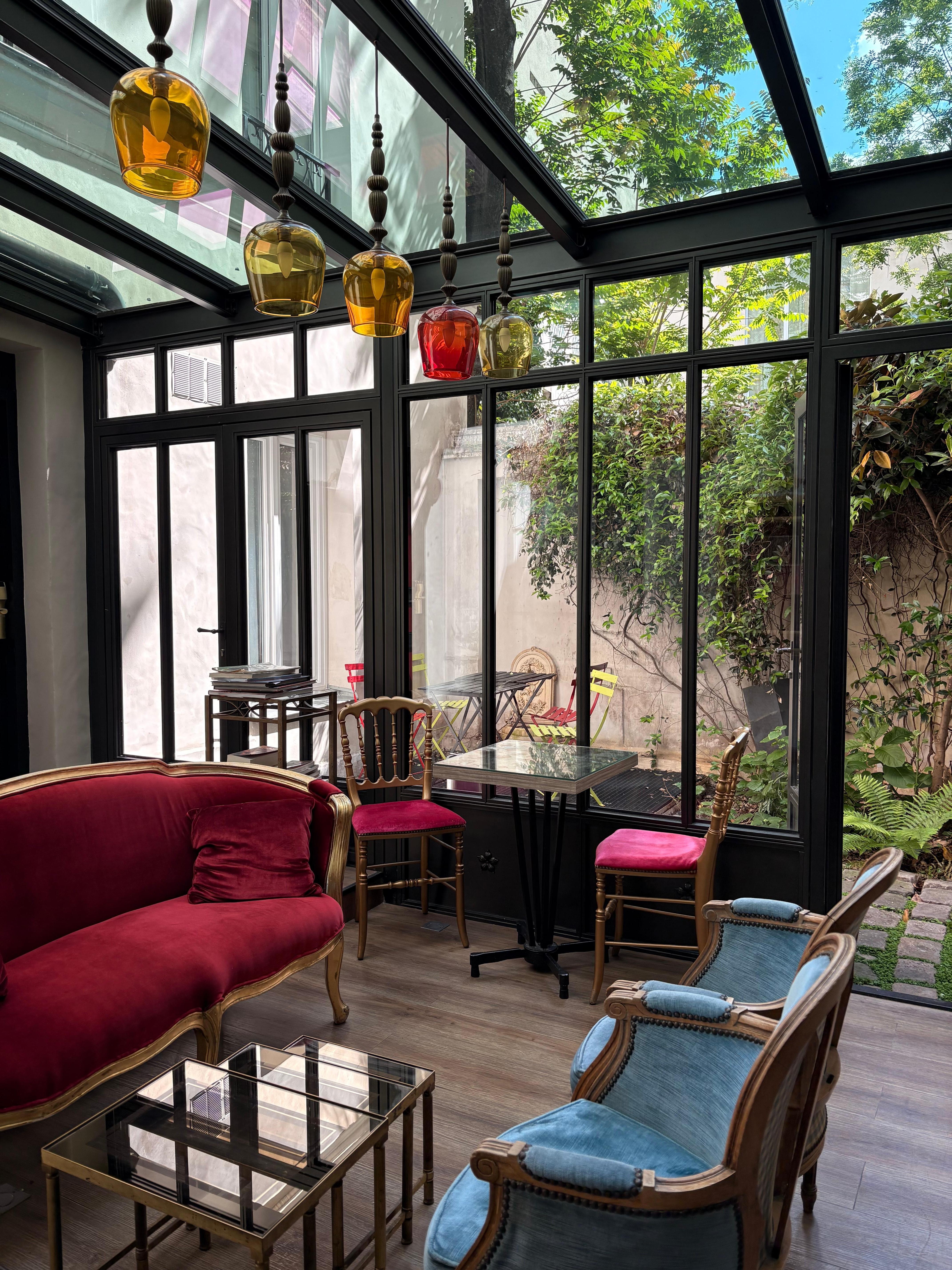 Behind the reception is a small sitting area and garden. 