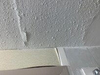 Water damage in bathroom, entire room is humid with windows that do not open