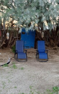 One of the sitting areas to contemplate mesquite trees and garden