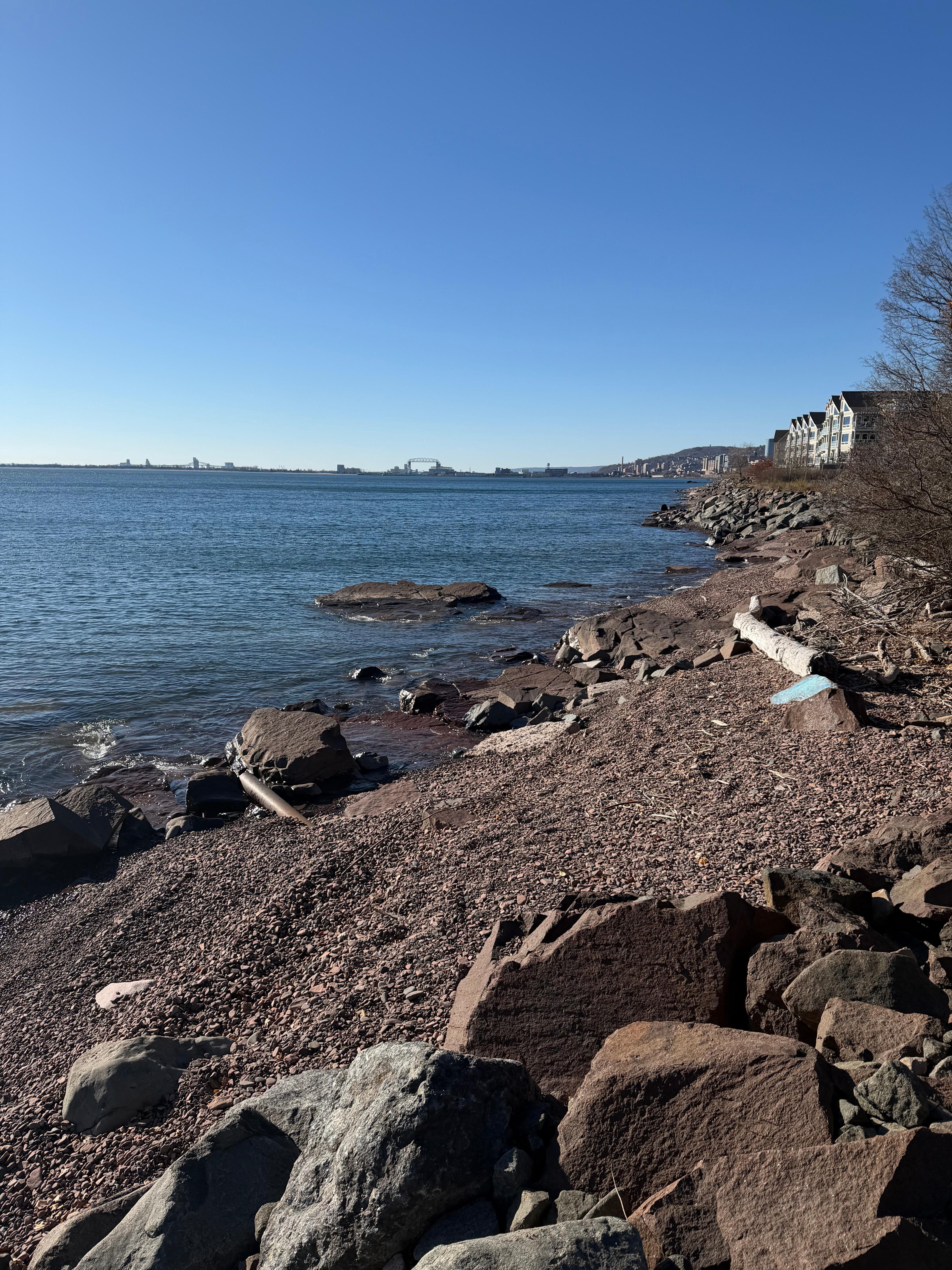 Just a 3 mile jog brought me into view of the Lift Bridge and stop at a bench along the rocky shore to sit and soak up the morning sun. Felt safe and neighborhood-like. A nice number of local folks (and visitors) out for their morning exercise too.