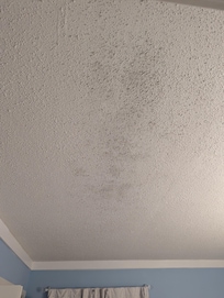 Dirt on ceiling from air vent