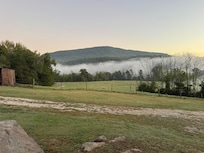 Low fog on the river, view from the cabin