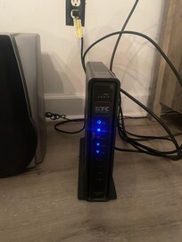 Power on, connected to something. The unlit portion is the "connected to internet", it's not lit since it wasn't connected.