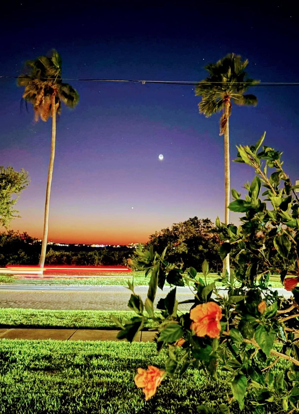 Having a glass of vine watching the sunset from outdoor covered patio.