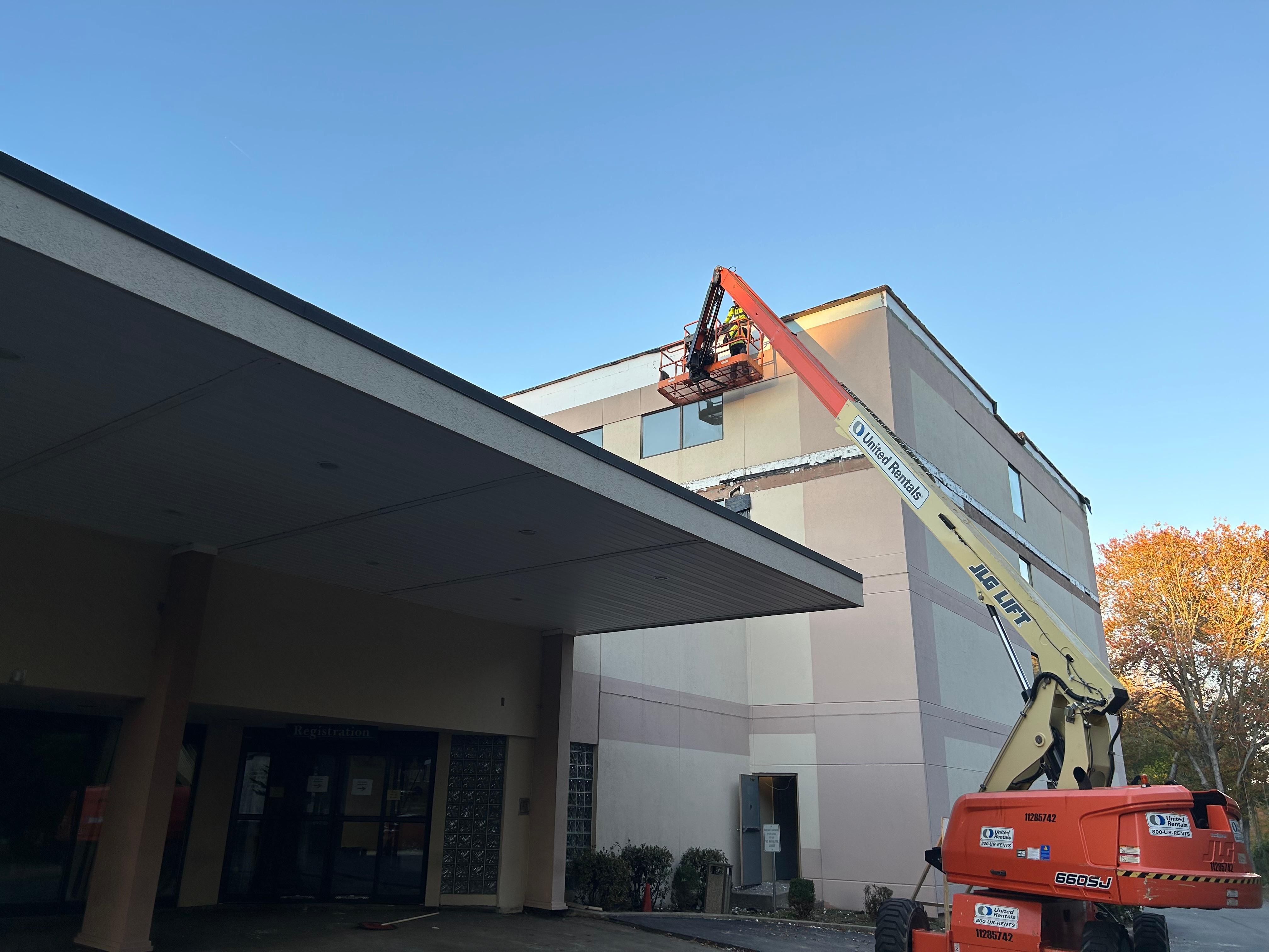 Cranes all over the building.