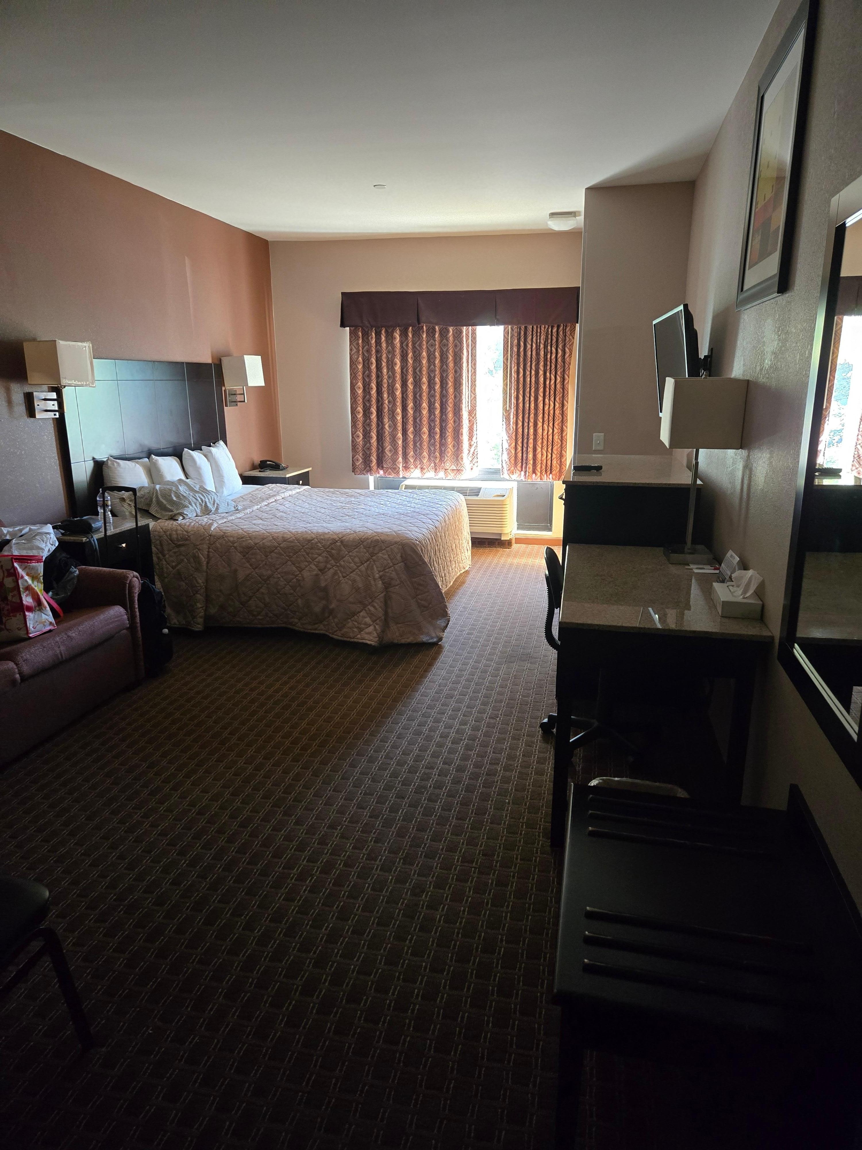 Large room with fridge and microwave