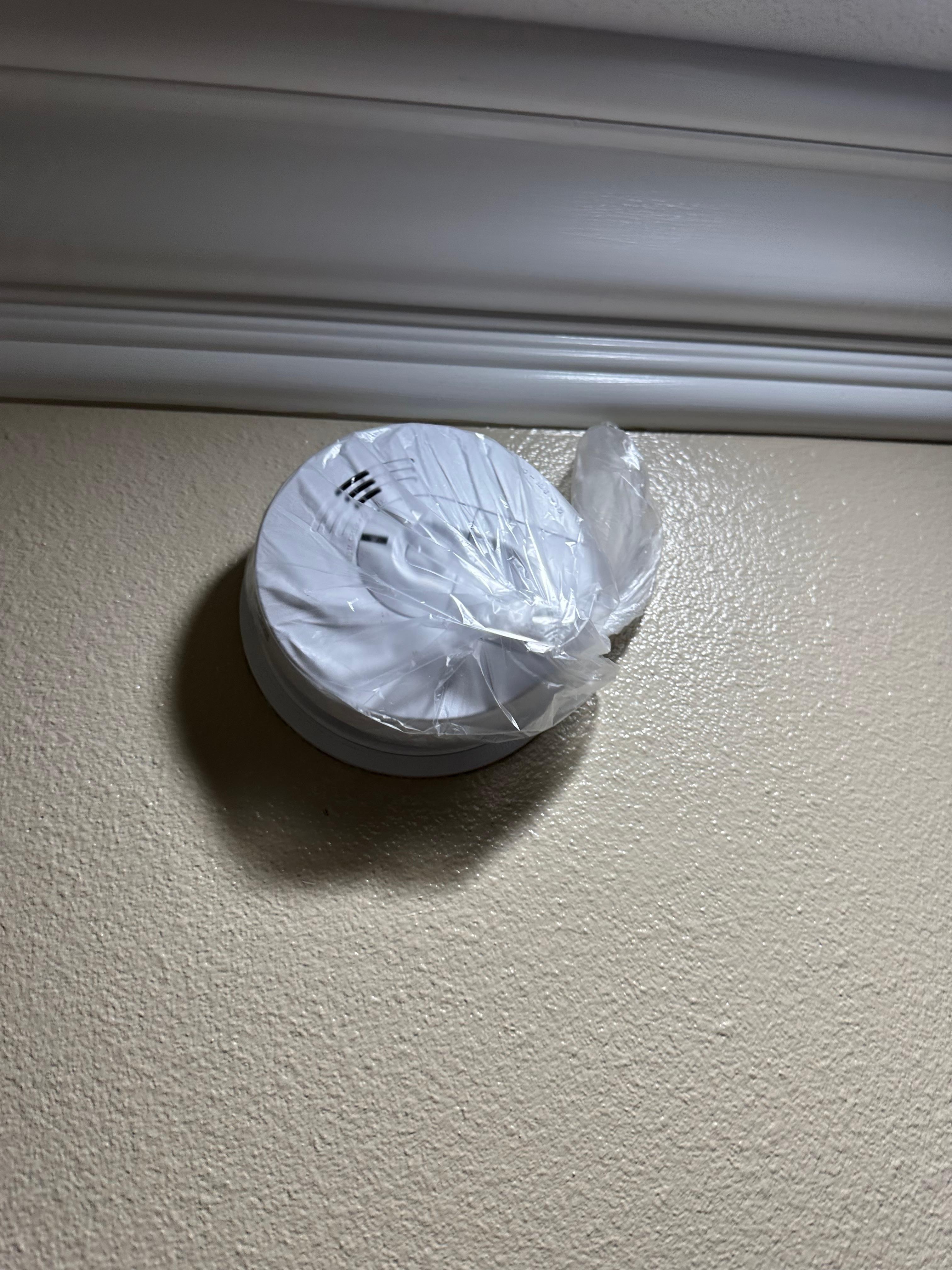 Smoke alarm was covered with a plastic bag 