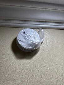 Smoke alarm was covered with a plastic bag