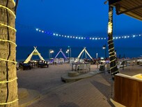 Beach out the front night time