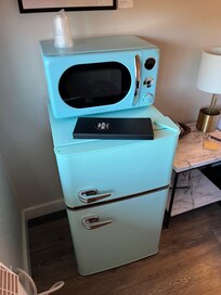 Retro mini fridge/freezer and microwave.