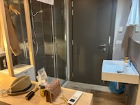 Extremely small bedroom room with no toilet