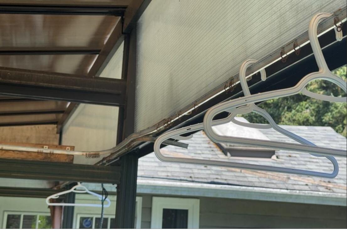 Random coat hangers hanging out on the patio
