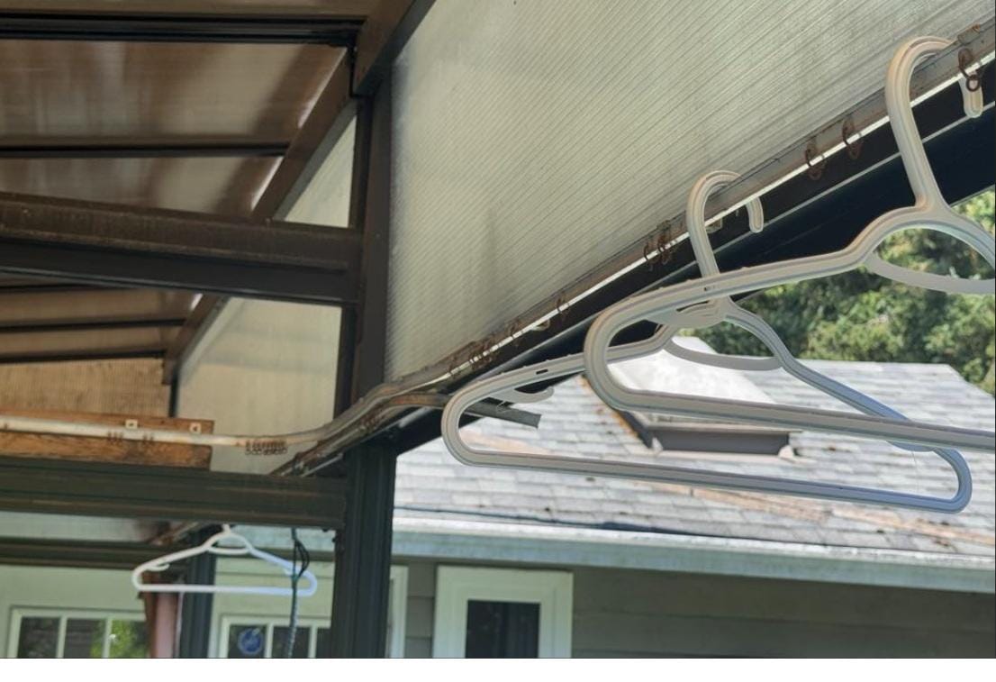 Random coat hangers hanging out on the patio