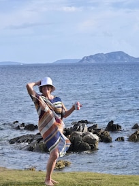 Enjoying the pool are overlooking the beach
