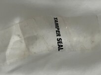 Tape stuck to bottom sheet