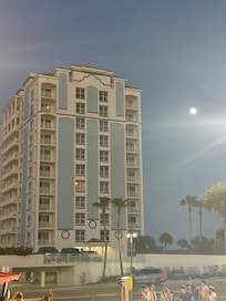 Parking garage is under the condominium. The condominium is a nice size, not too big and not too small. Very easy to navigate and the elevator wait is not long!