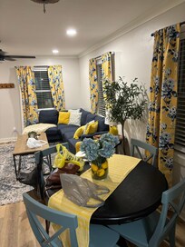 Living/dining. Coordinated decor throughout