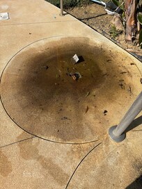 Pool side shower drain.