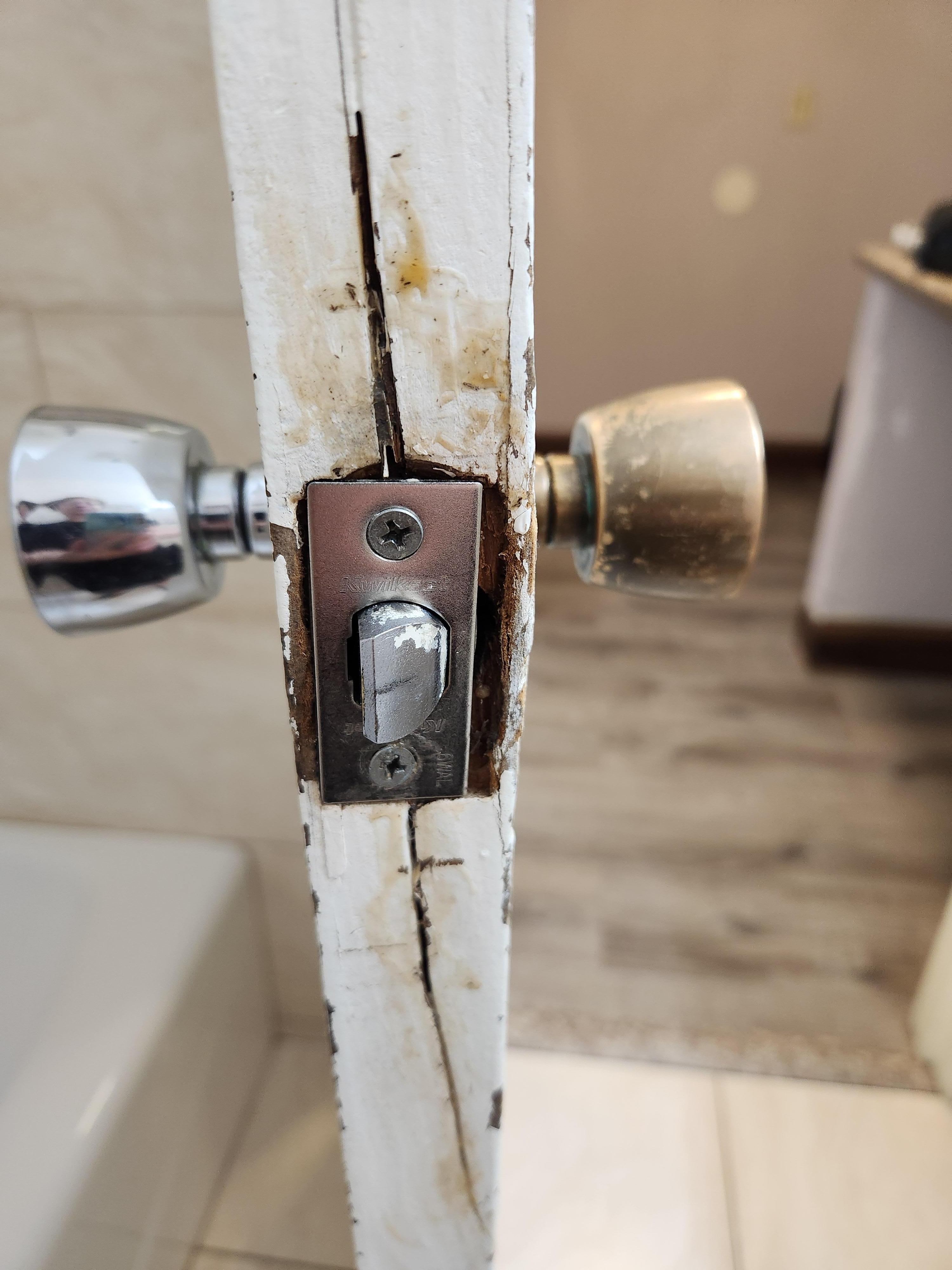 Door to bathroom after "repair." 