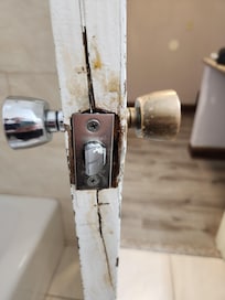 Door to bathroom after "repair."