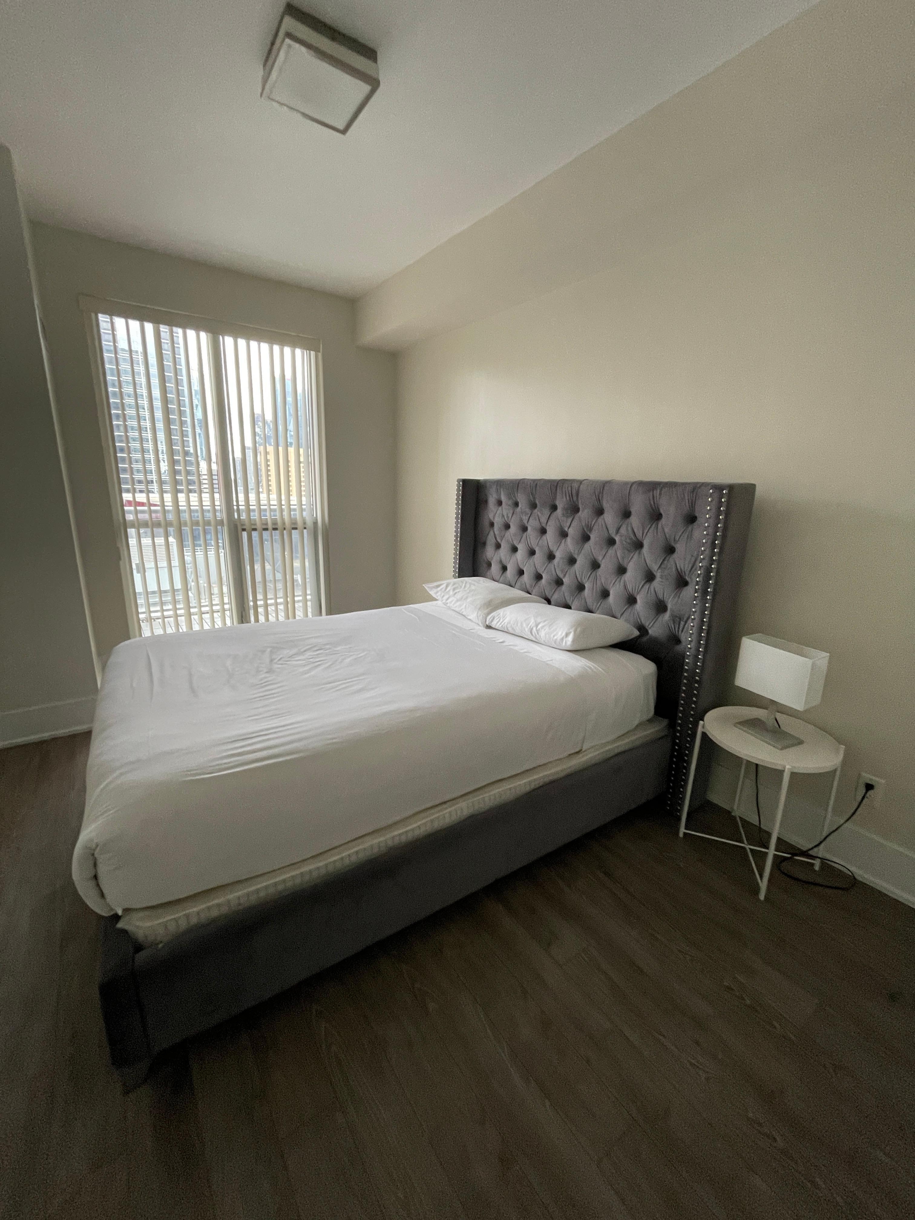 Master bedroom. No dressers, no where to put your suitcase. Bare minimum.