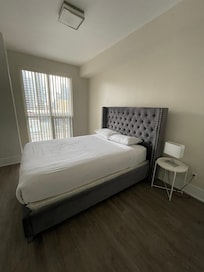 Master bedroom. No dressers, no where to put your suitcase. Bare minimum.