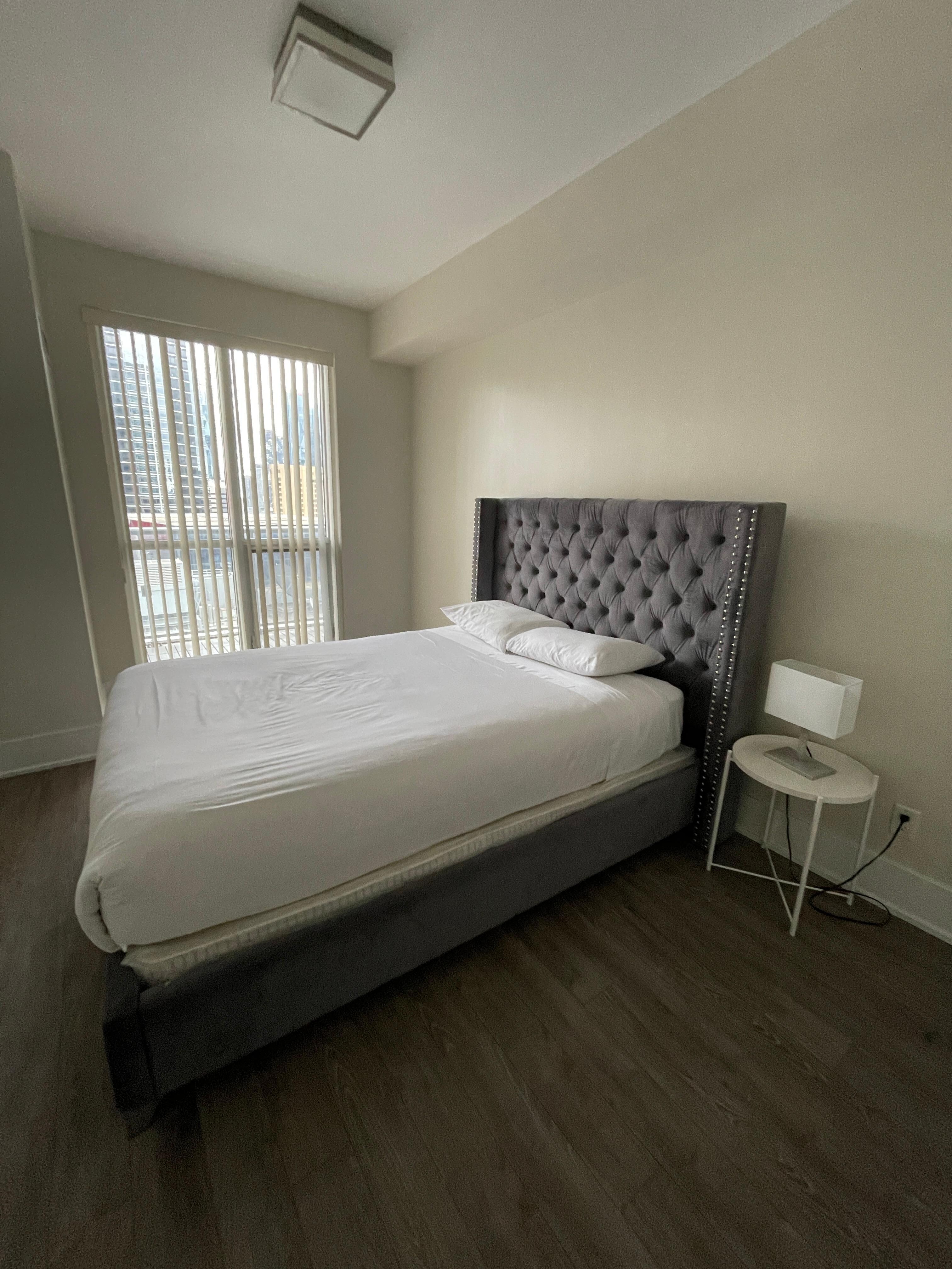Master bedroom. No dressers, no where to put your suitcase. Bare minimum. 