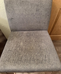 Stains on dining chair in room