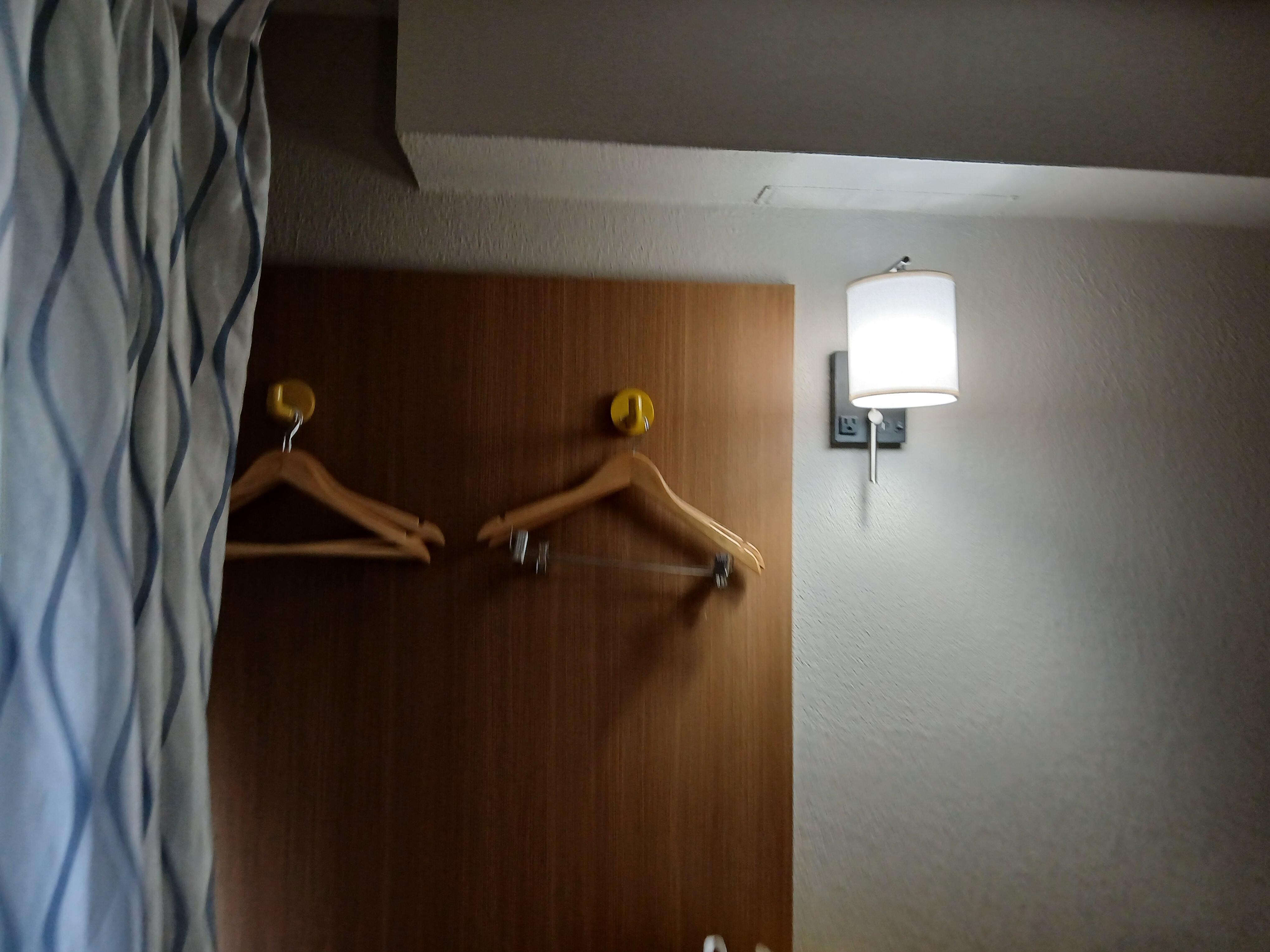 Clothing hangars are thankfully provided
