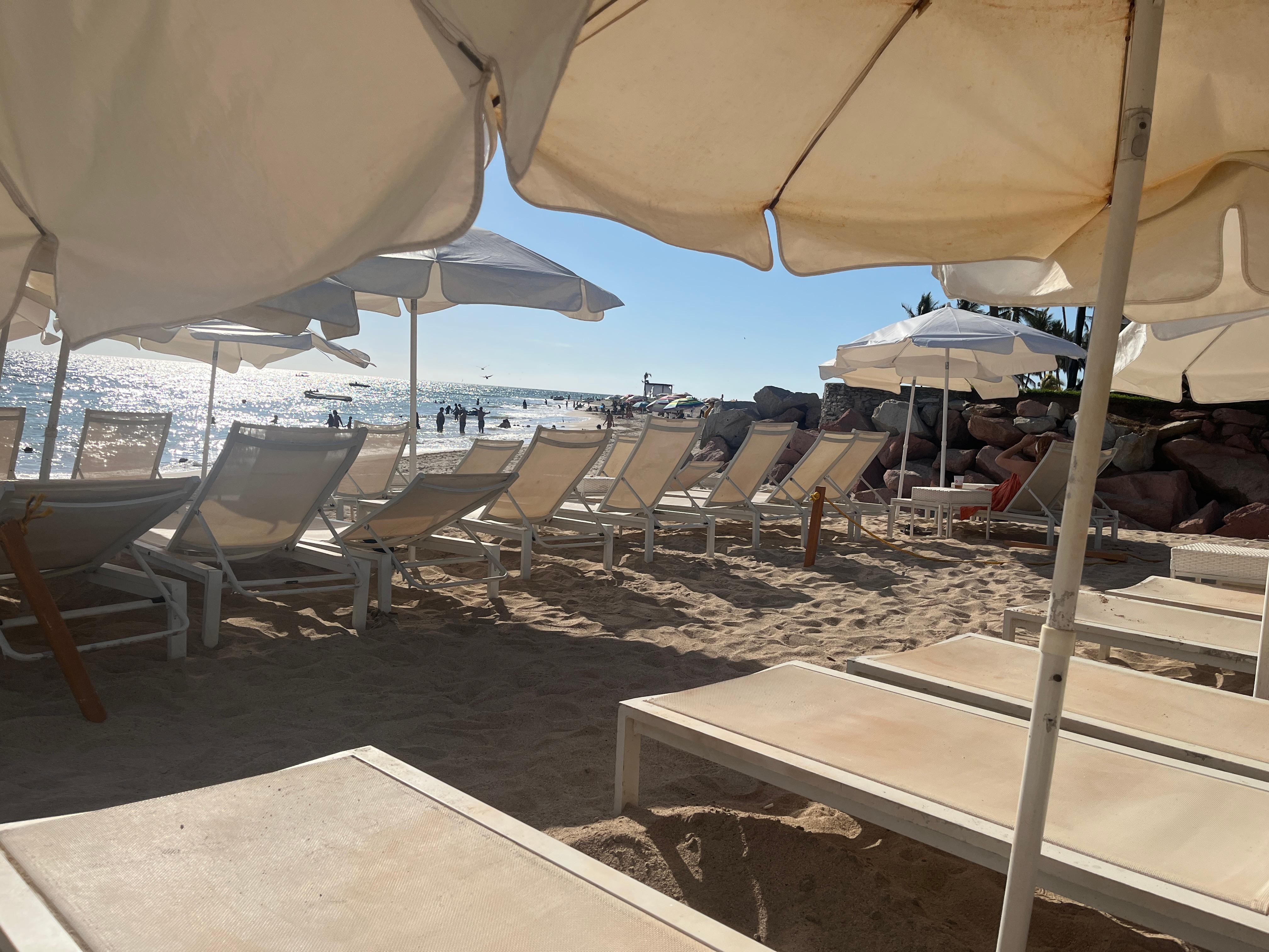Even though so many chairs were empty security still kicked us out.  Mio guests are not permitted to sit on loungers or access shade under these umbrellas.  