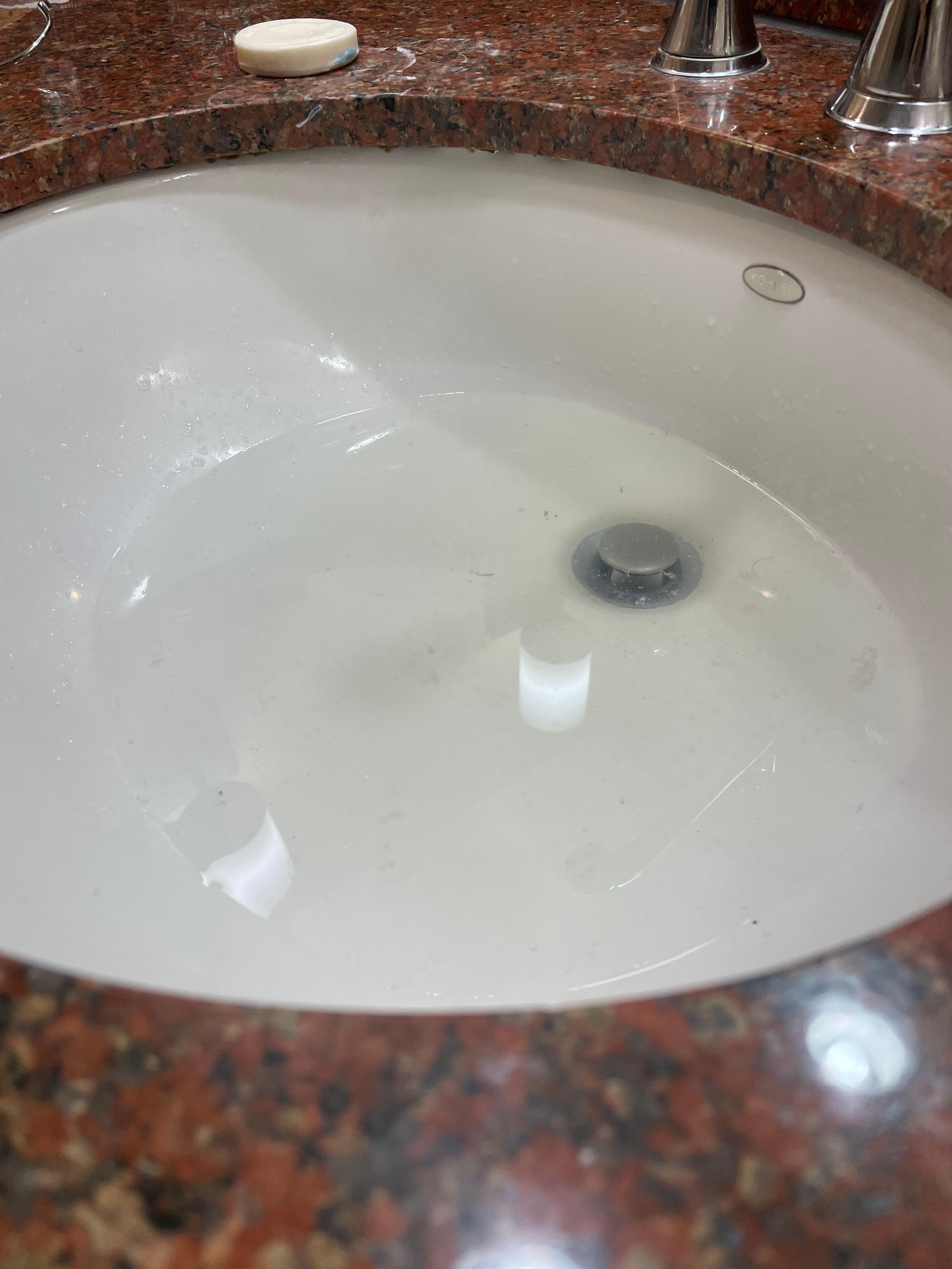 Sewer water came up in the sink when people from other rooms flushed the toilet. 