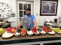 The owner with his breakfast spread.