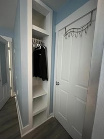 Built in closet- only space to hang clothes- less than 12” wide