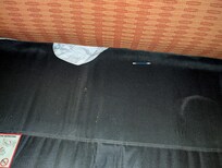 Old Q-tip under the fold out couch bed cushions.