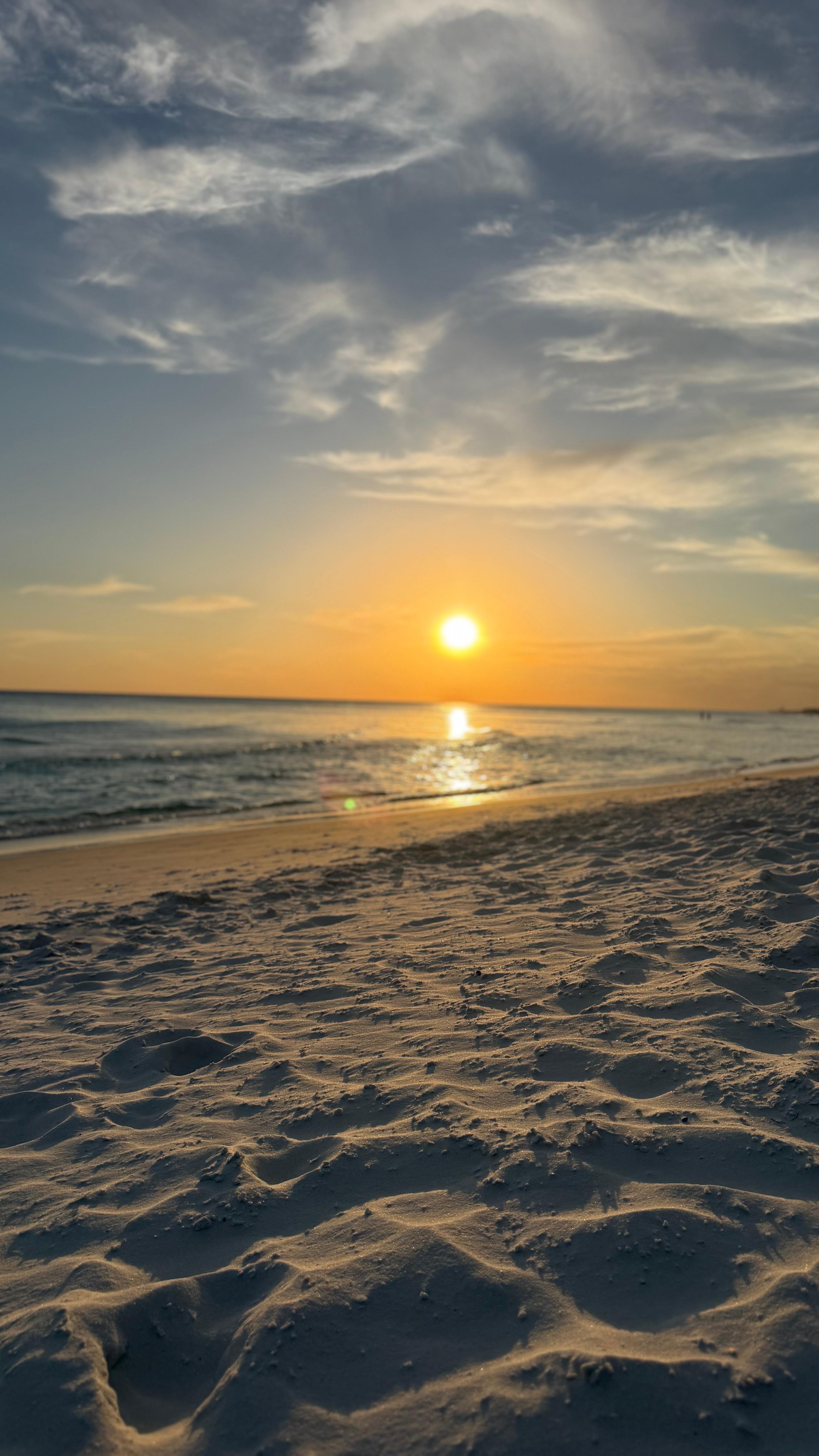 Sunset on beach just an elevator ride and steps away 