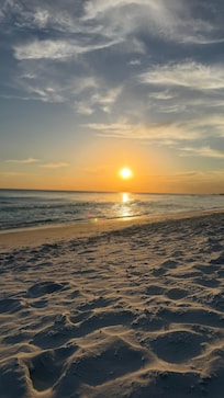 Sunset on beach just an elevator ride and steps away
