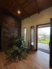 Sweet entryway with live plants growing inside.