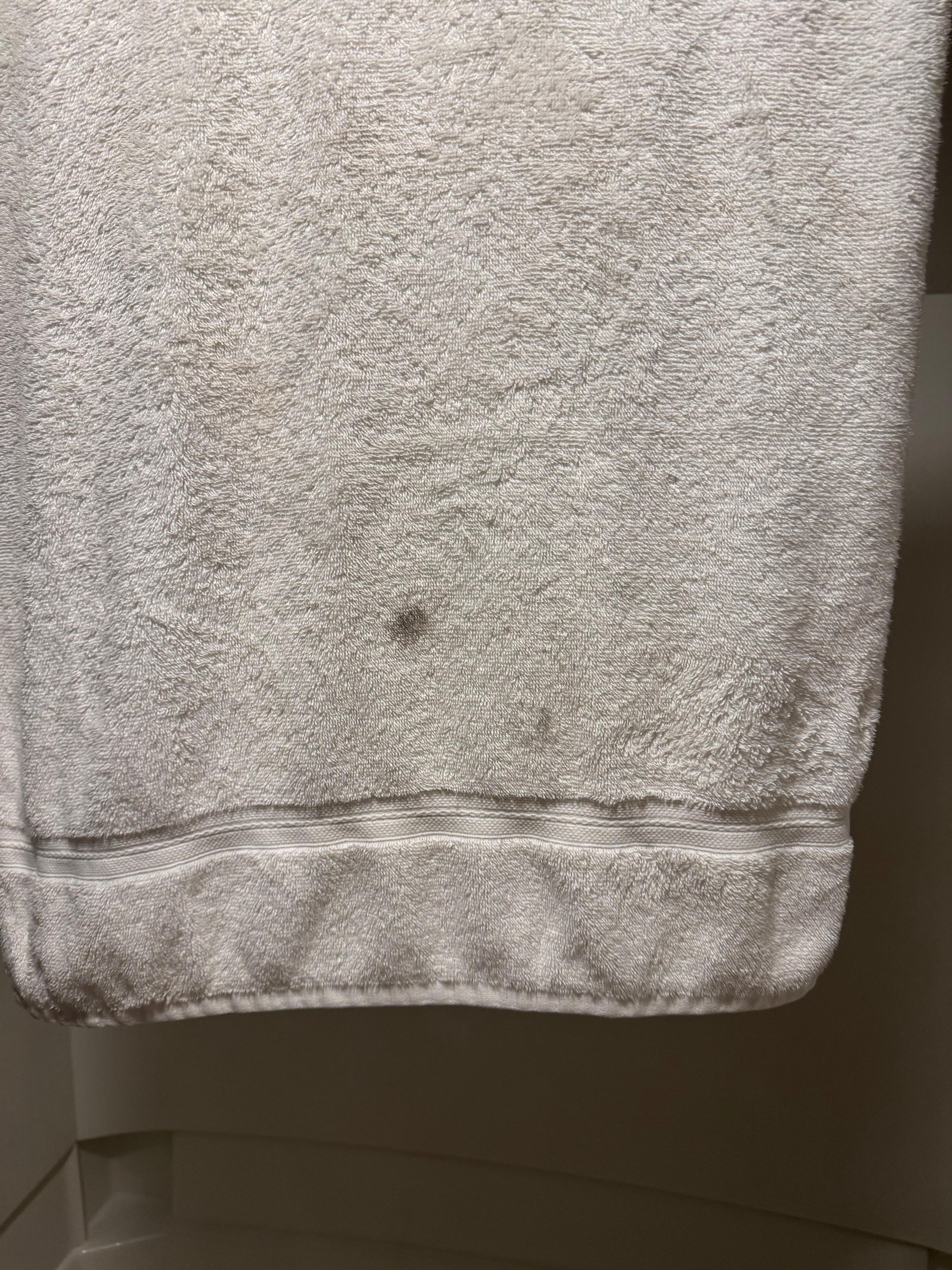 One of the towels they give you to dry your body, as you can see stain.