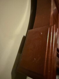 Dust on bed post
