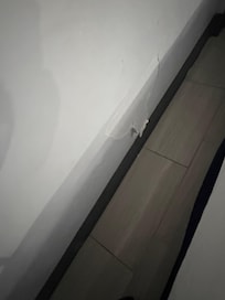 Paint peeling on wall